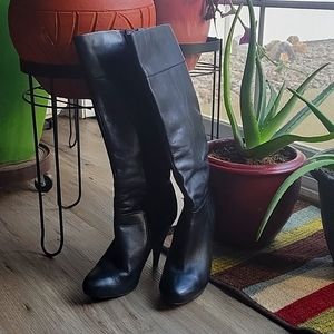 Knee high leather boots by Aldo